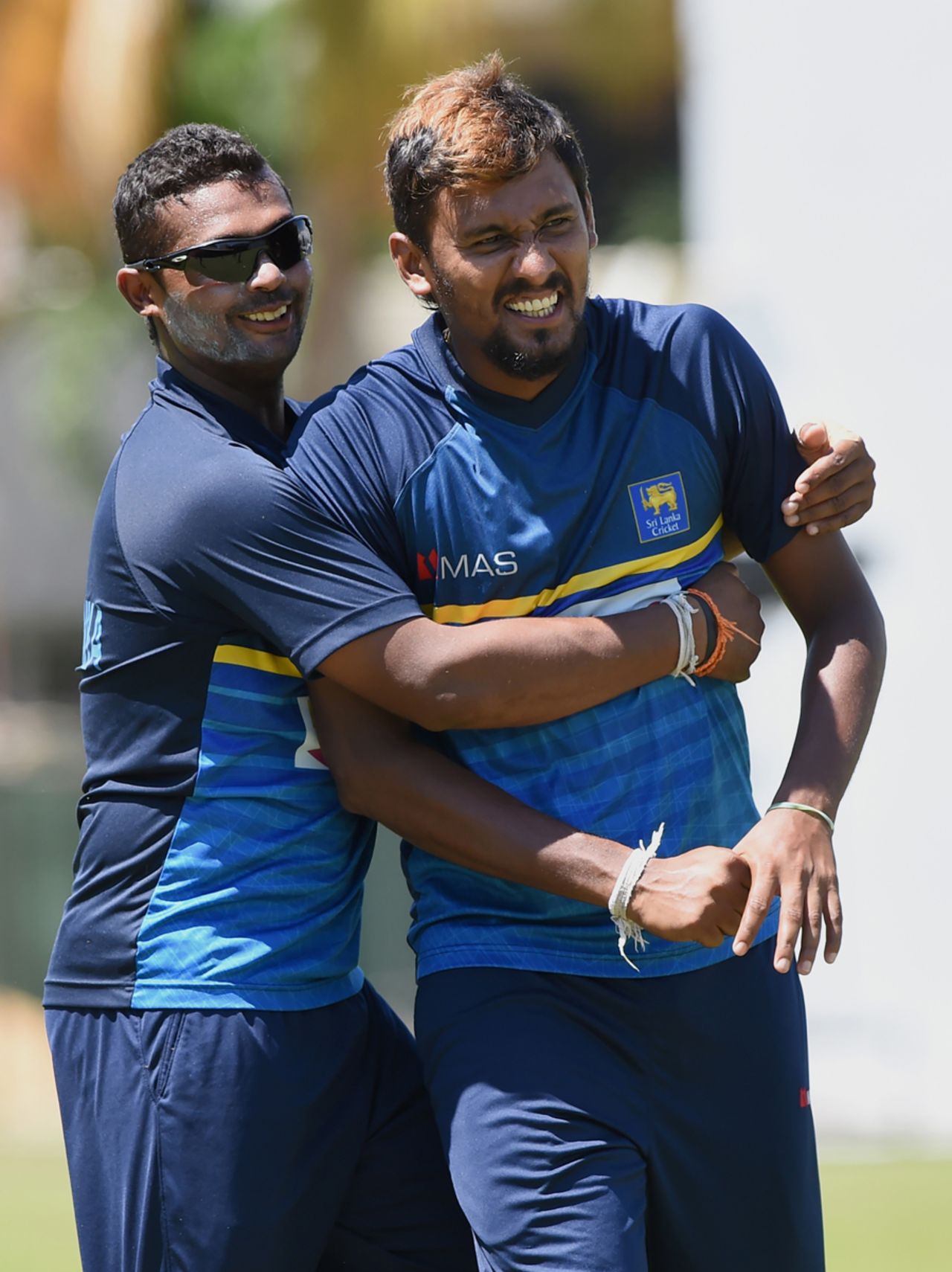 Asela Gunaratne (L) and Suranga Lakmal have a good laugh in between training, Colombo, March 13, 2017