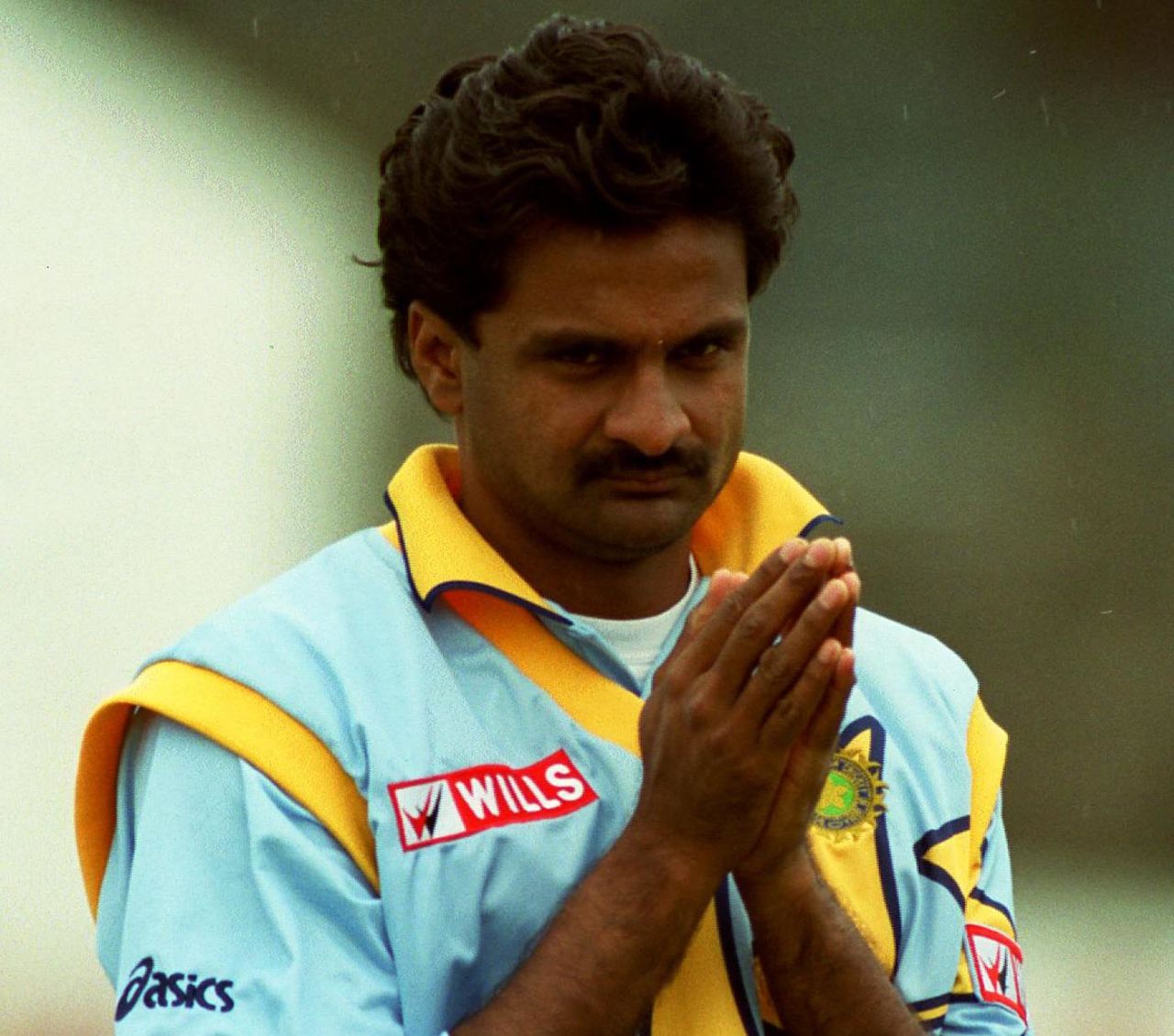 Javagal Srinath keeps warm during a warm-up match against Leicestershire, Leicester, May 7, 1999