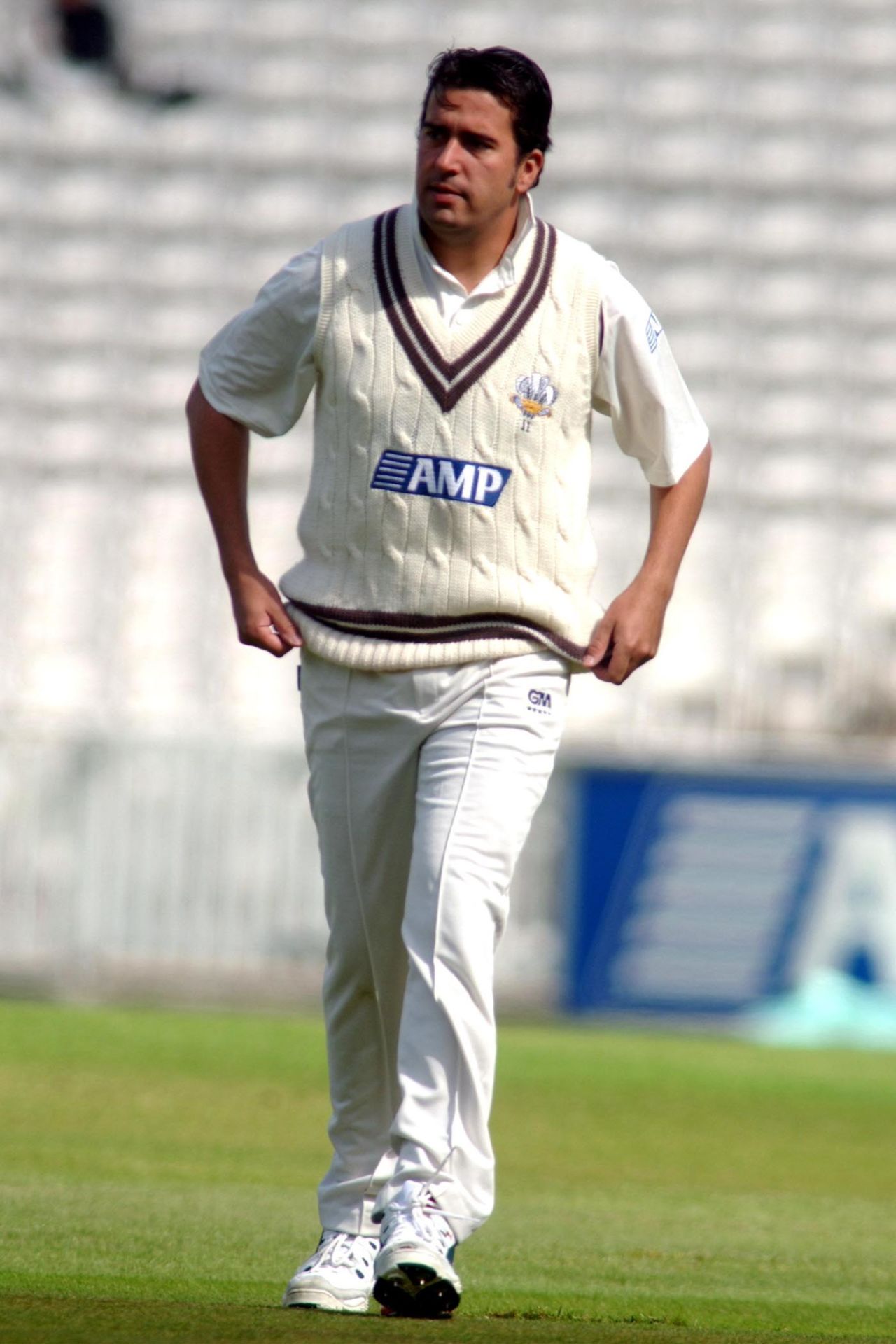 Surrey's Jimmy Ormond stands in the field