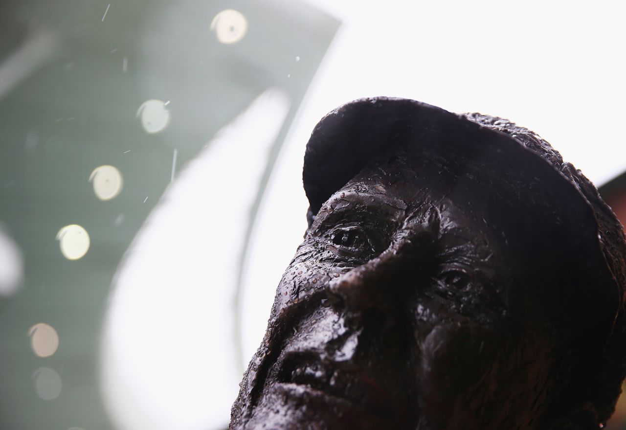 Rain falls on the statue of Stan McCabe, Australia v West Indies, third Test, day four, Sydney, January 6, 2016