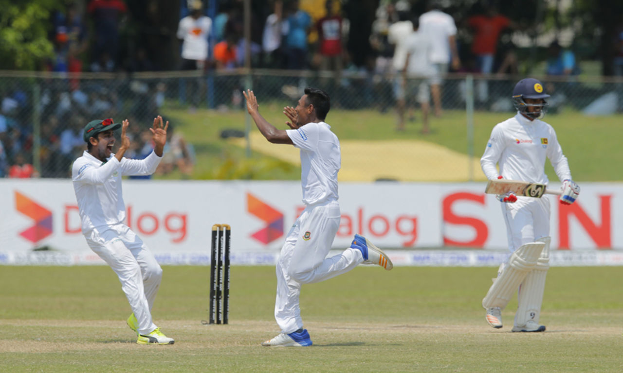 Mustafizur Rahman celebrates the wicket of Dhananjaya de Silva with Mehedi Hasan Miraz, Sri Lanka v Bangladesh, 2nd Test, Colombo, 4th day, March 18, 2017