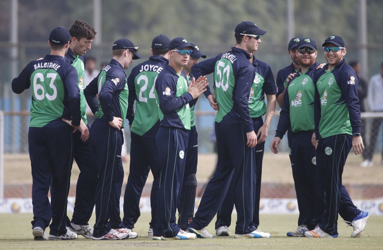 Ireland players gather to celebrate a wicket, Afghanistan v Ireland, 3rd ODI, Greater Noida, March 19, 2017
