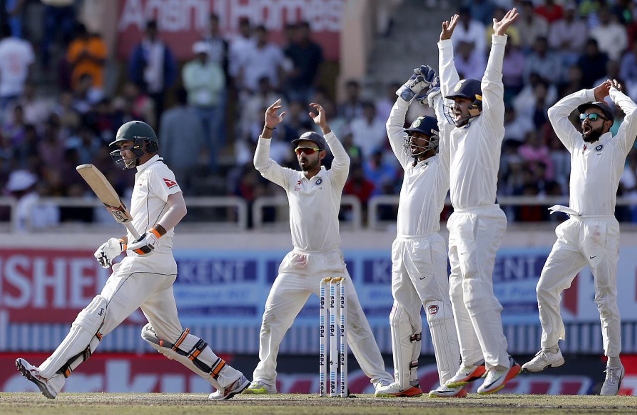 India's close-in fielders go up in unison after Glenn Maxwell is struck on his pads, India v Australia, 3rd Test, Ranchi, 5th day,  March 20, 2017