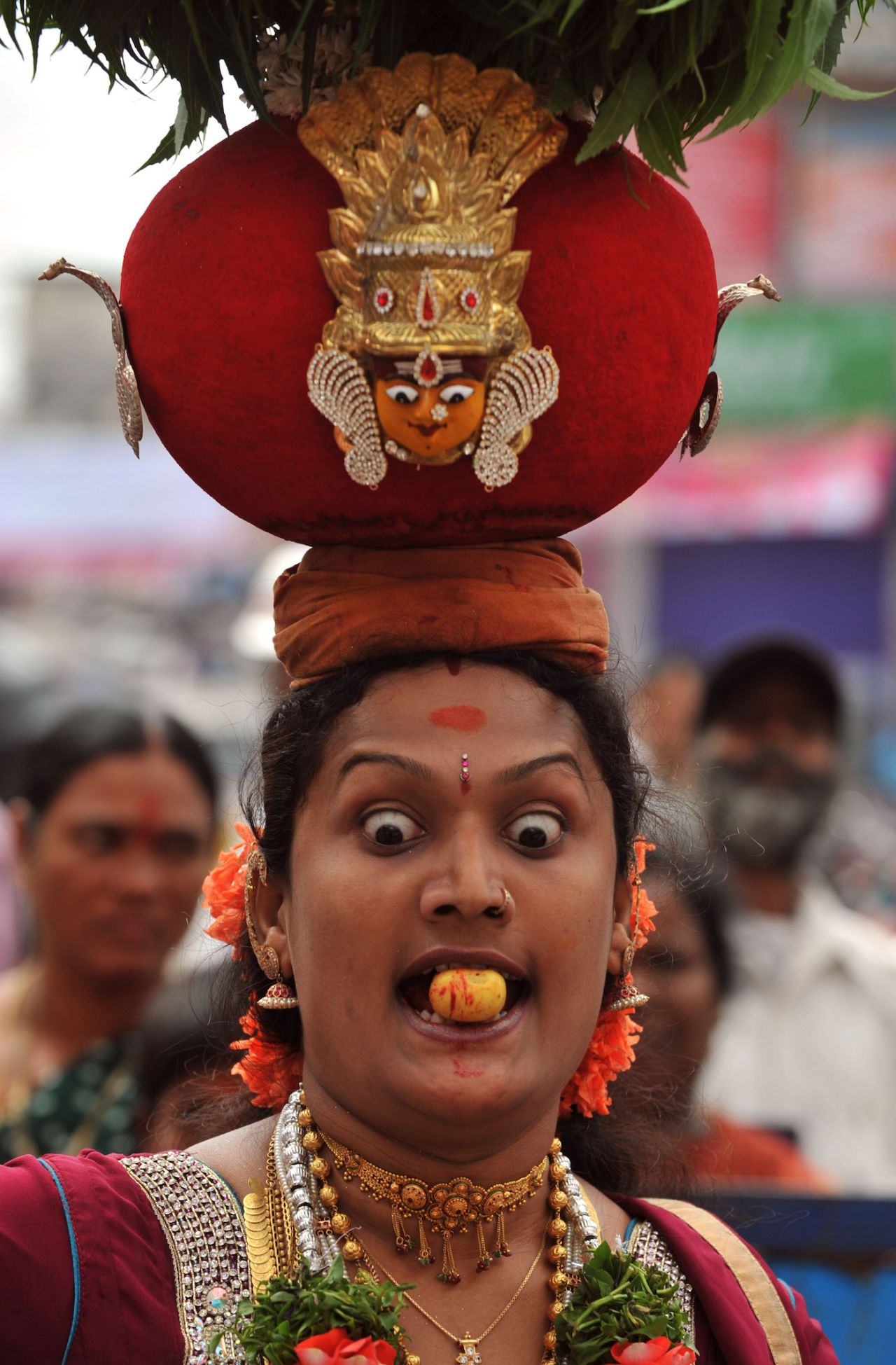 A transgender devotee of Goddess Kali dances during the Bonalu festival