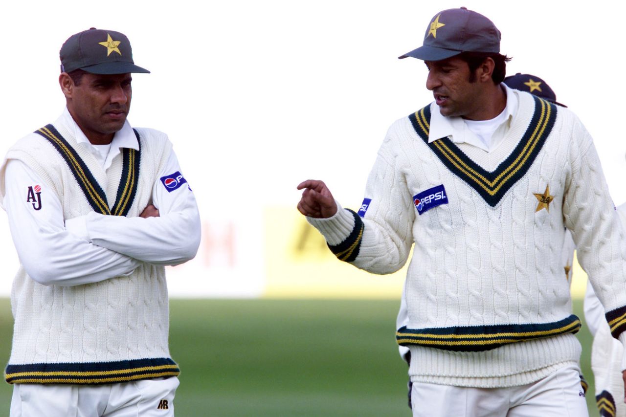 Wasim Akram and Waqar Younis have a chat while leaving the field, British Universities v Pakistanis, tour match, Trent Bridge, 1st day, May 4, 2001