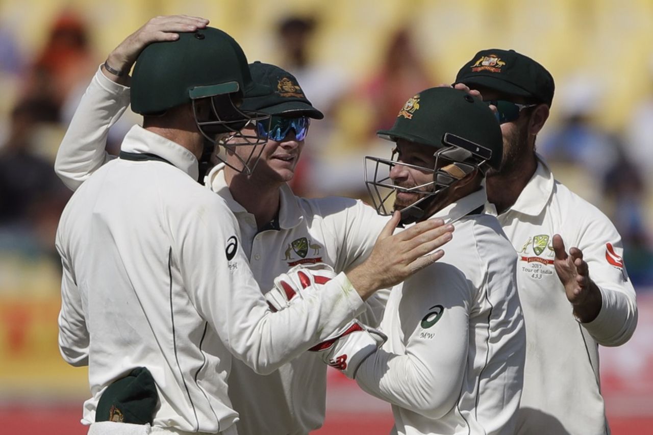 Australia's players get together to celebrate a wicket, India v Australia, 4th Test, Dharamsala, 2nd day, March 26, 2017