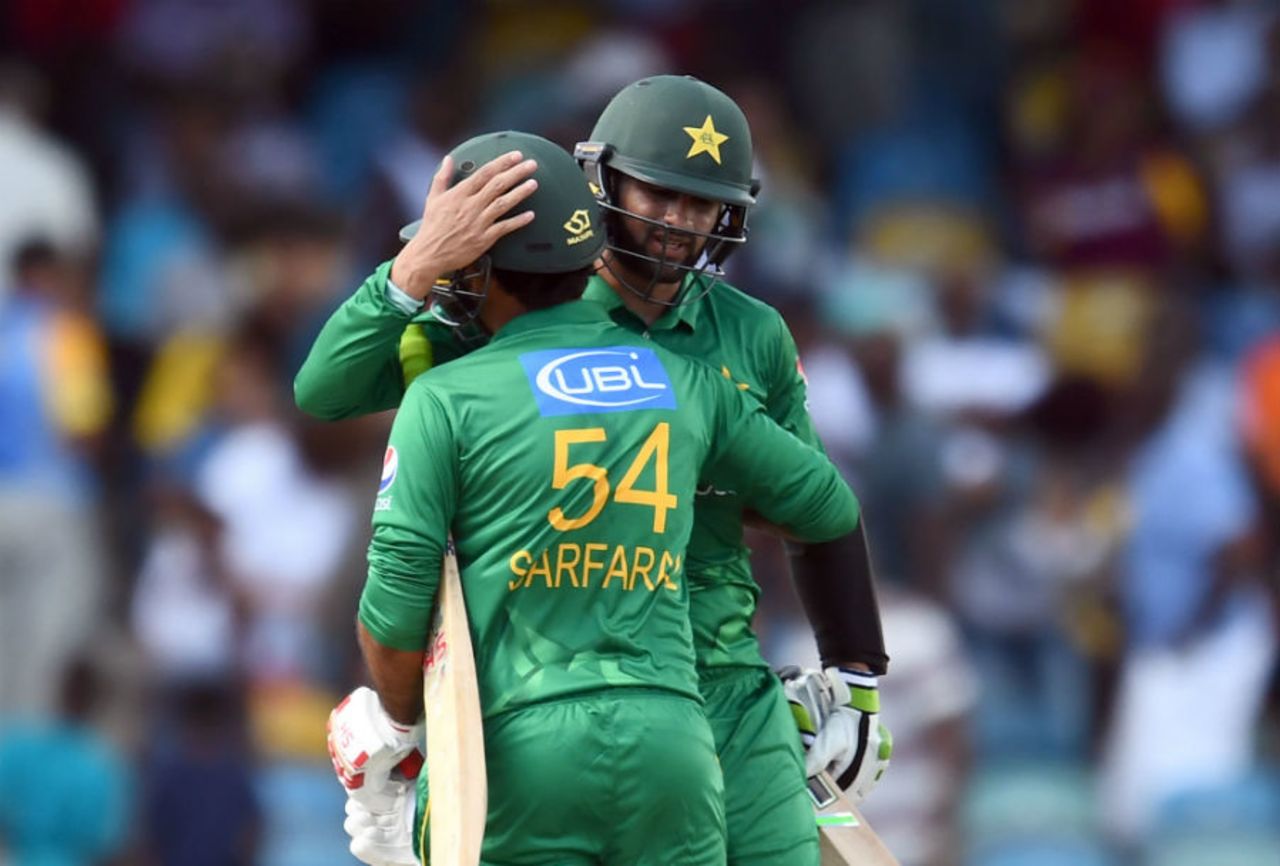 Shoaib Malik is congratulated by his captain after the winning runs are hit, West Indies v Pakistan, 1st T20I, Bridgetown, March 26, 2017