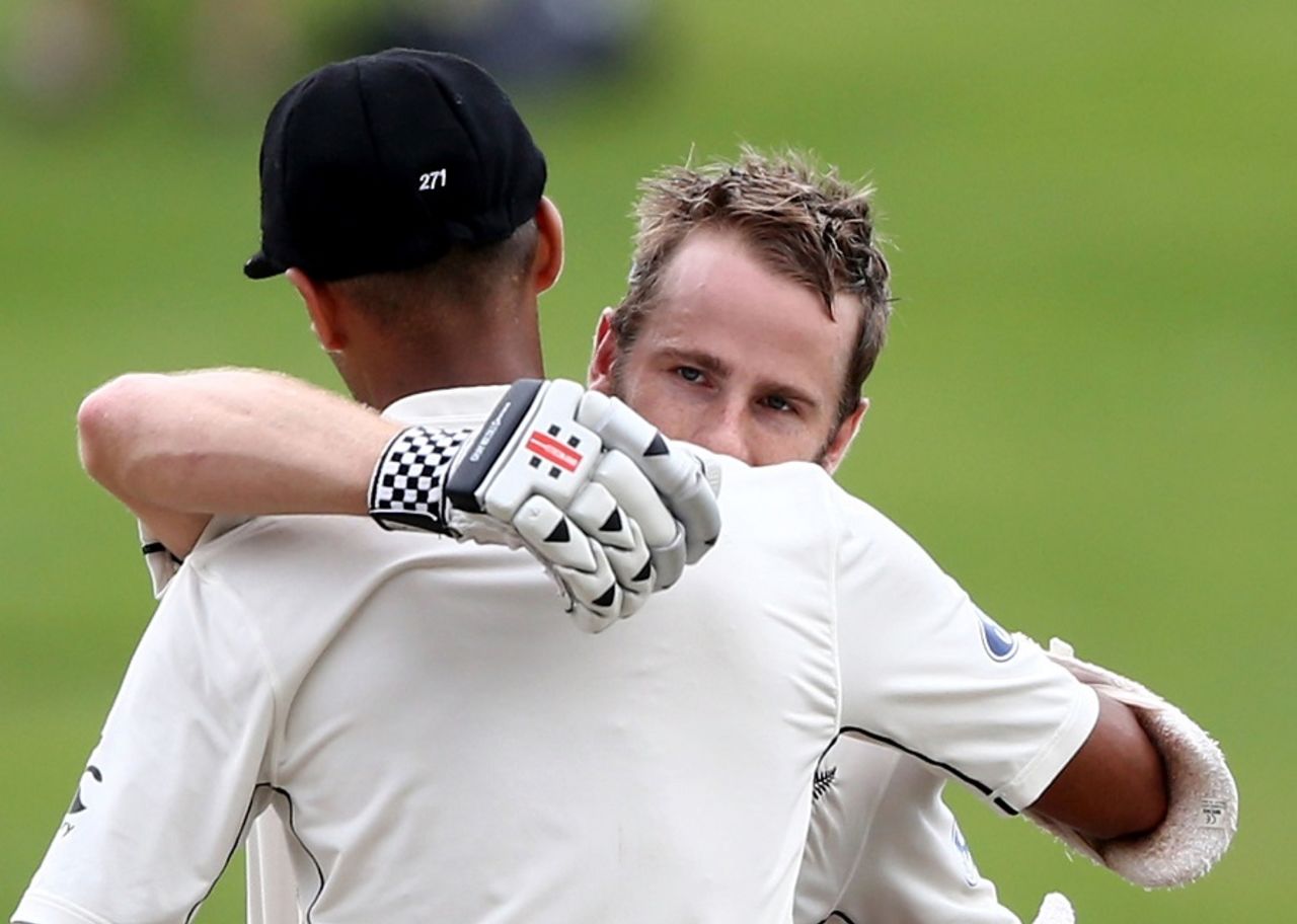 Kane Williamson is embraced by Jeet Raval after his century, New Zealand v South Africa, 3rd Test, Hamilton, 3rd day, March 27, 2017