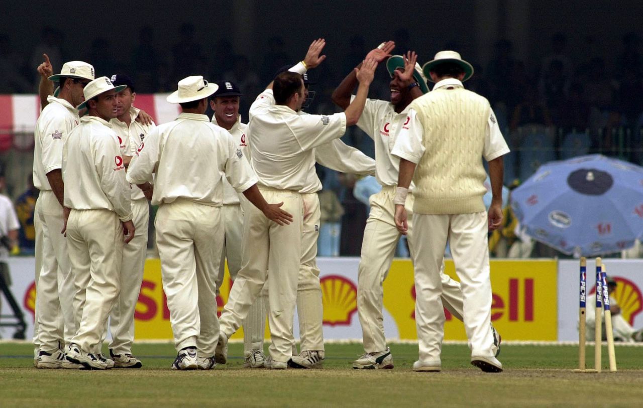 Alex Tudor congratulates Craig White on a wicket, Pakistan v England, 1st Test, Lahore, 4th day, November 18, 2000