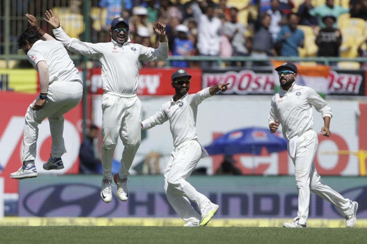 India's fielders celebrate after Umesh Yadav dismissed Matt Renshaw, India v Australia, 4th Test, Dharamsala, 3rd day, March 27, 2017