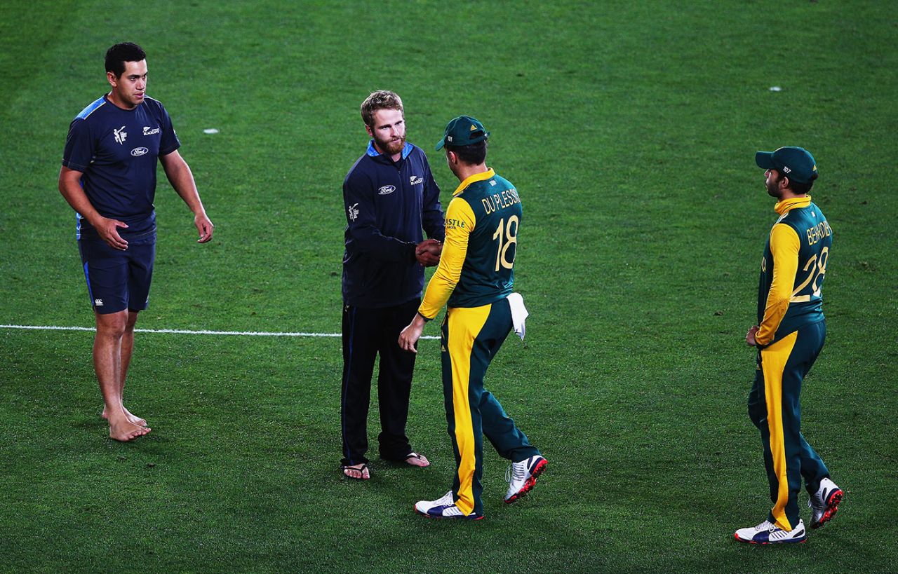 Ross Taylor and Kane Williamson commiserate with Faf du Plessis and Farhaan Behardien, New Zealand v South Africa, World Cup 2015, 1st semi-final, Auckland, March 24, 2015