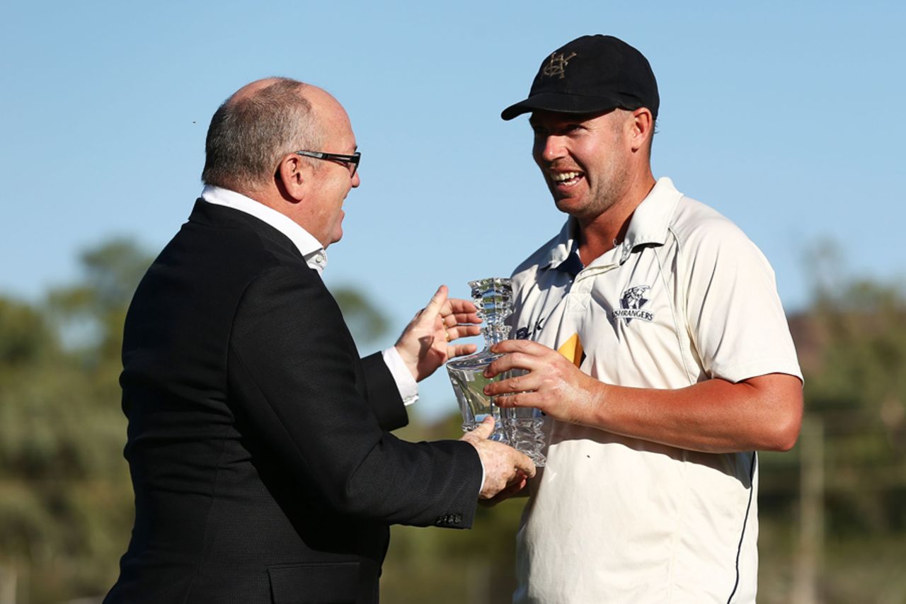 Jon Holland receives the Player-of-the-Match award, Victoria v South Australia, Sheffield Shield final, Alice Springs, 5th day, March 30, 2017