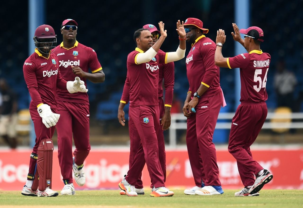 Samuel Badree is mobbed by his team-mates, West Indies v Pakistan, 2nd T20, Port of Spain, March 30, 2017