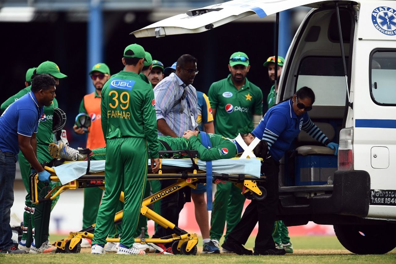Ahmed Shehzad was stretchered off the field after a collision with Chadwick Walton , West Indies v Pakistan, 2nd T20, Port of Spain, March 30, 2017