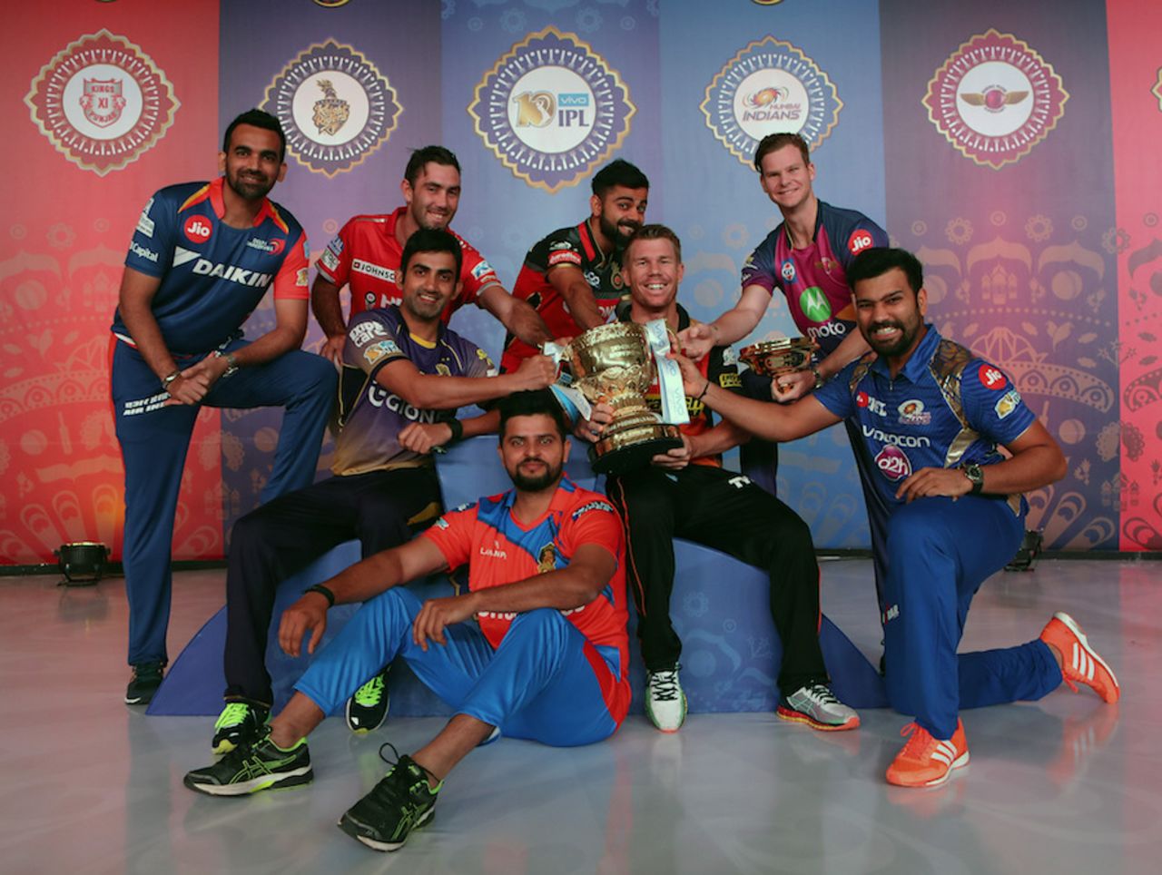 The IPL captains - Zaheer Khan, Suresh Raina, Glenn Maxwell, Gautam Gambhir, Rohit Sharma, Steven Smith, Virat Kohli and David Warner - with the trophy, April 4, 2017