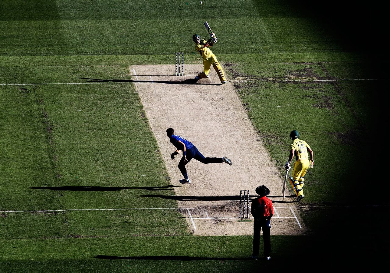 Glenn Maxwell plowers a shot down the ground only to be spectacularly caught at the boundary, Australia v England, Group A, World Cup 2015, Melbourne, February 14, 2015
