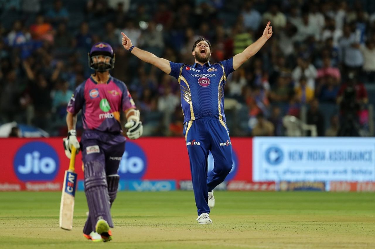 Mitchell McClenaghan roars after taking a wicket, Rising Pune Supergiant v Mumbai Indians, IPL 2017, Pune, April 6, 2017
