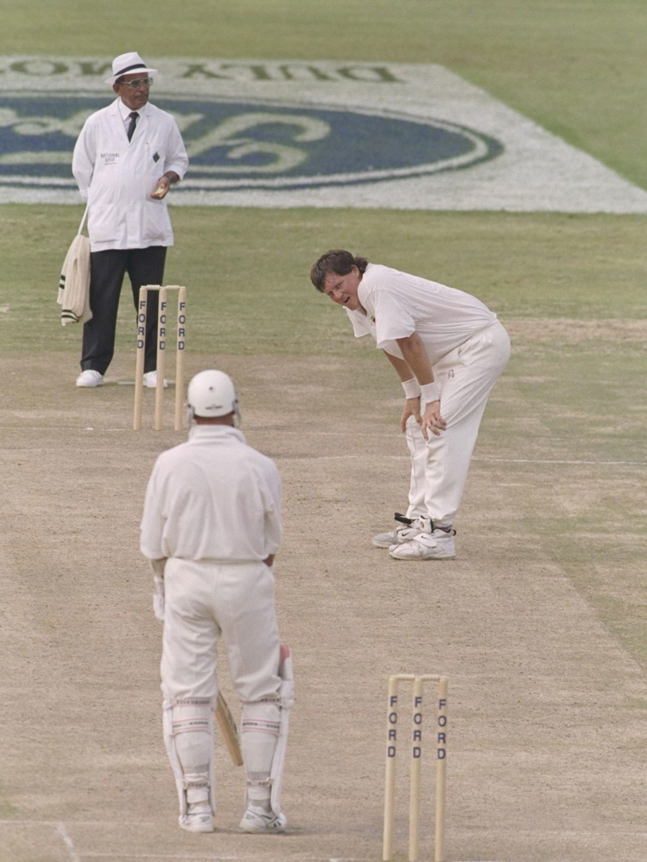 Eddo Brandes bends with his hands on his knees after an appeal was turned down, Zimbabwe v England, second Test, day three, Harare, December 28, 1996
