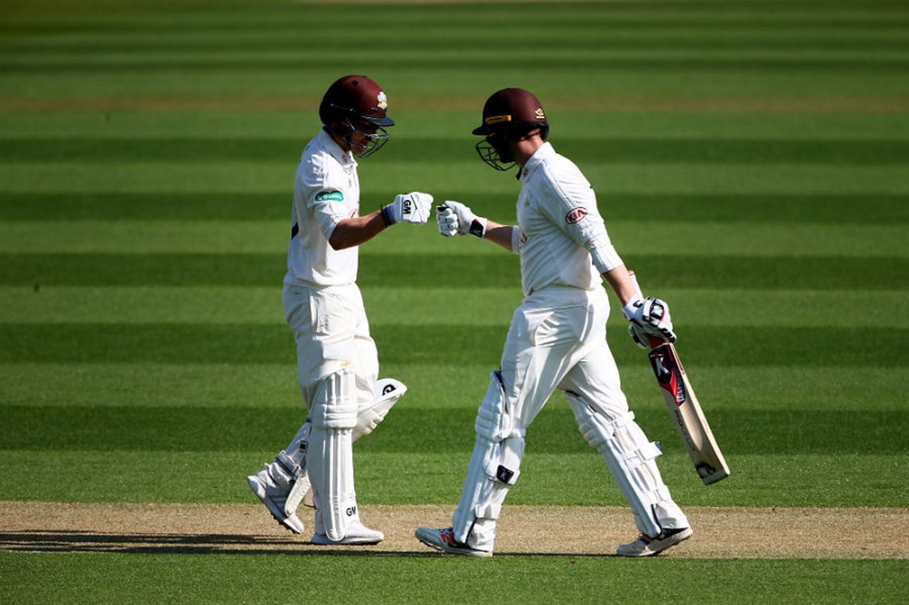 Mark Stoneman and Rory Burns punch gloves during their opening stand for Surrey, Surrey v Warwickshire, Specsavers County Championship, 1st day, The Kia Oval, April 7, 2017