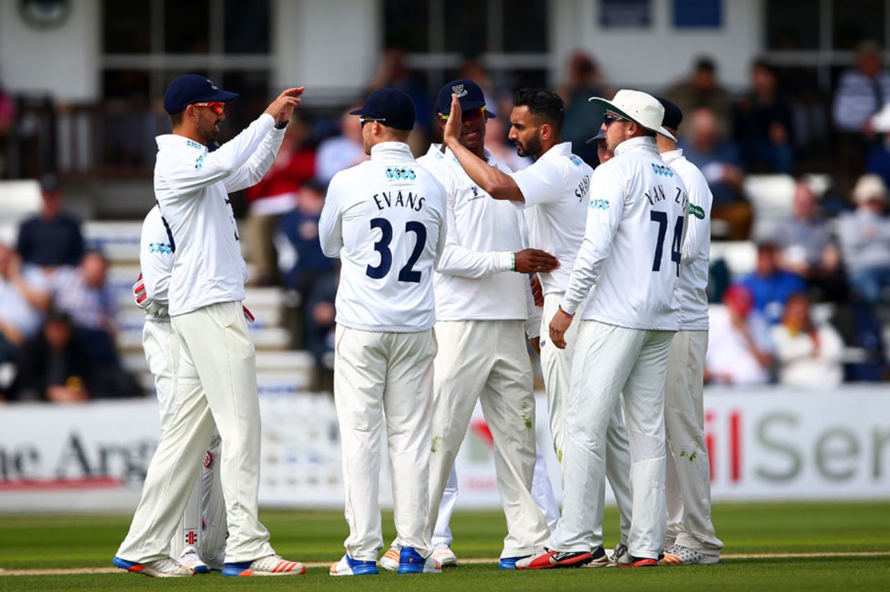 Ajmal Shahzad is congratulated on a wicket, Sussex v Kent, County Championship, Division Two, Hove, 1st day, April 14, 2017