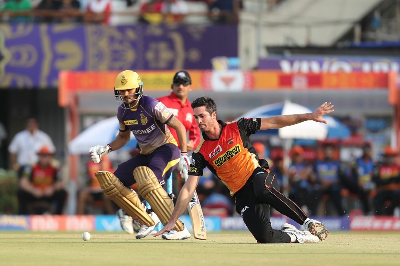 Ben Cutting tries to stop a single off his own bowling, Kolkata Knight Riders v Sunrisers Hyderabad, IPL 2017, Kolkata, April 15, 2017