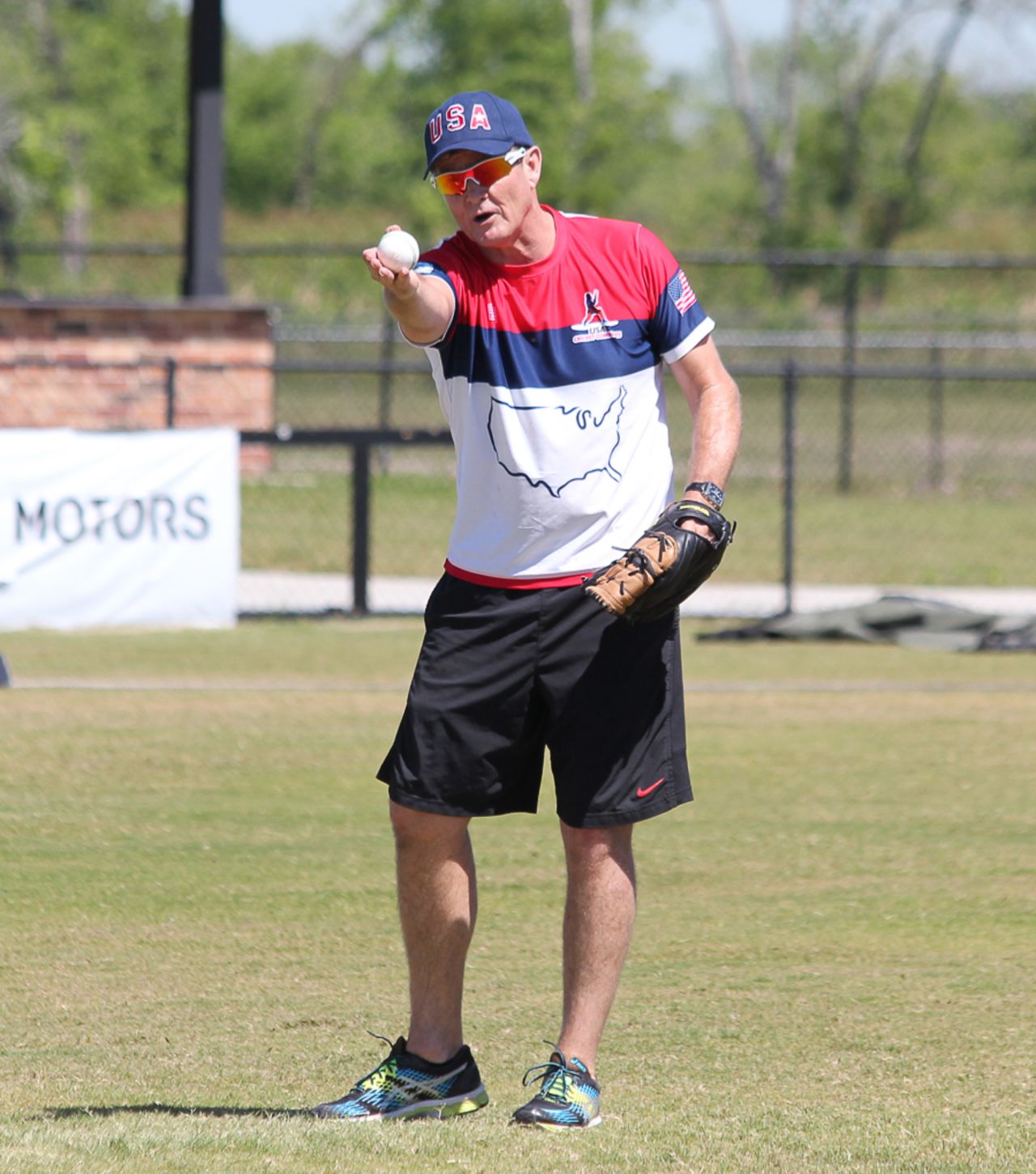Trevor Penney gives some extra pointers during a fielding drill, Pearland, April 6, 2017