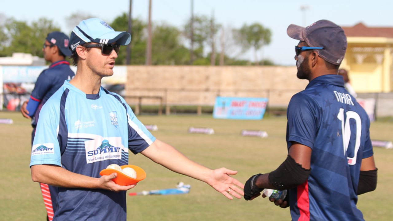 Coach Beau Casson shares bowling advice with USA left-arm spinner Prashanth Nair, Pearland, April 6, 2017
