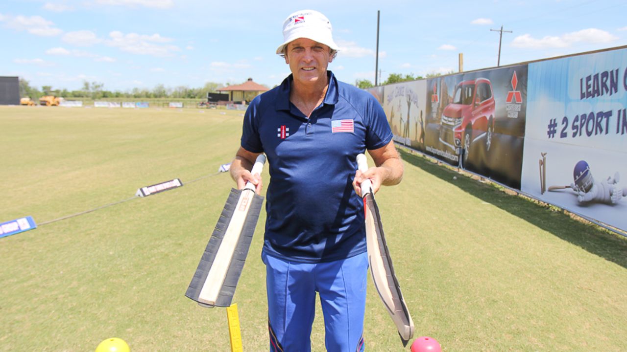 Peter Anderson shows off a prototype bat for training to catch edges, Pearland, April 8, 2017