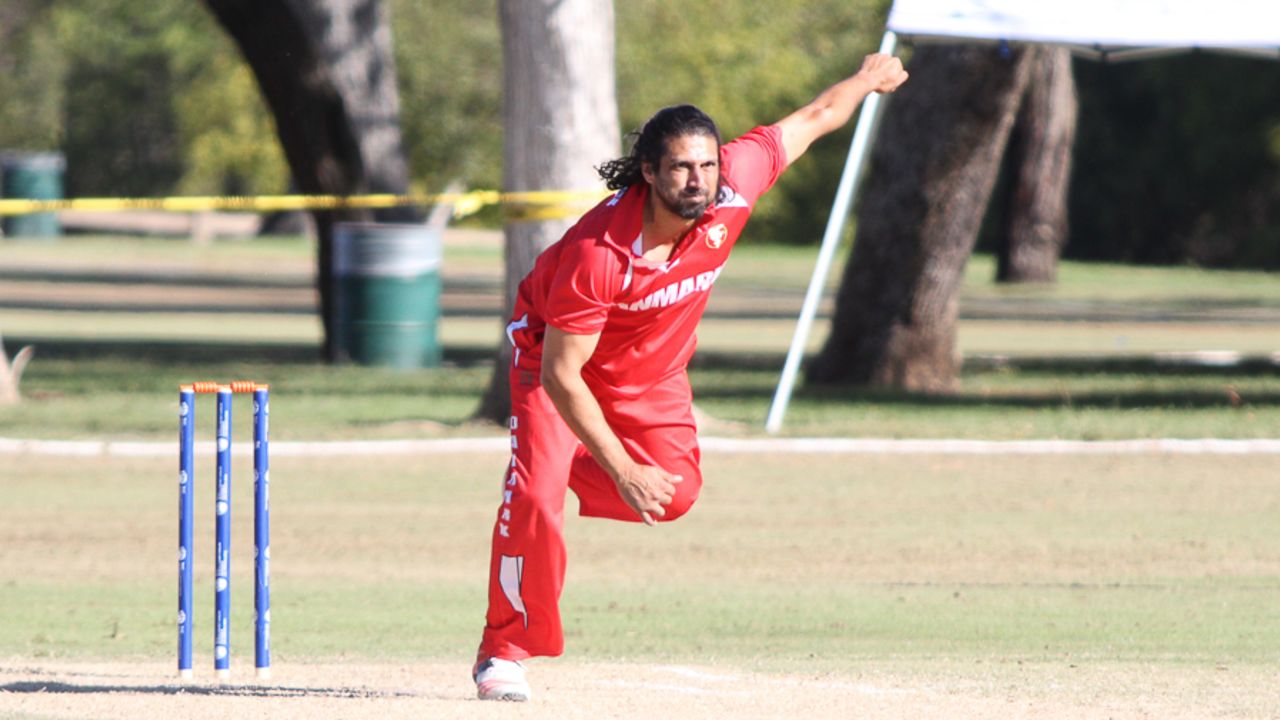 Amjad Khan follows through during his opening spell, USA v Denmark, ICC World Cricket League Division Four, Los Angeles, November 2, 2016