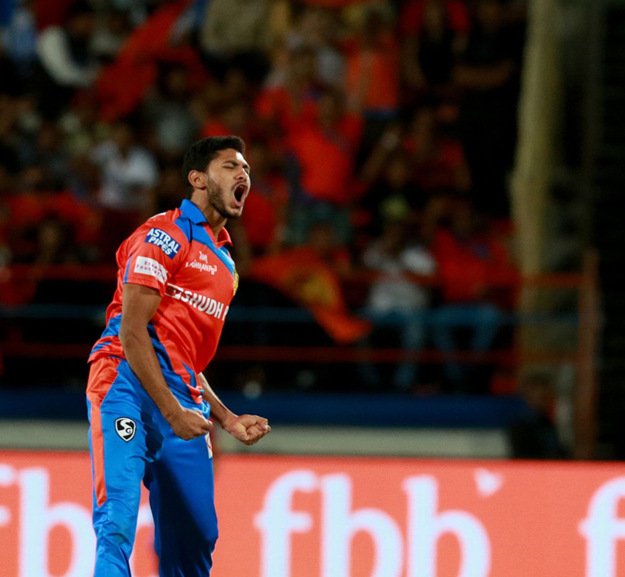 Basil Thampi exults after dismissing Chris Gayle, Royal Challengers Bangalore v Gujarat Lions, Rajkot, IPL 2017, April 18, 2017