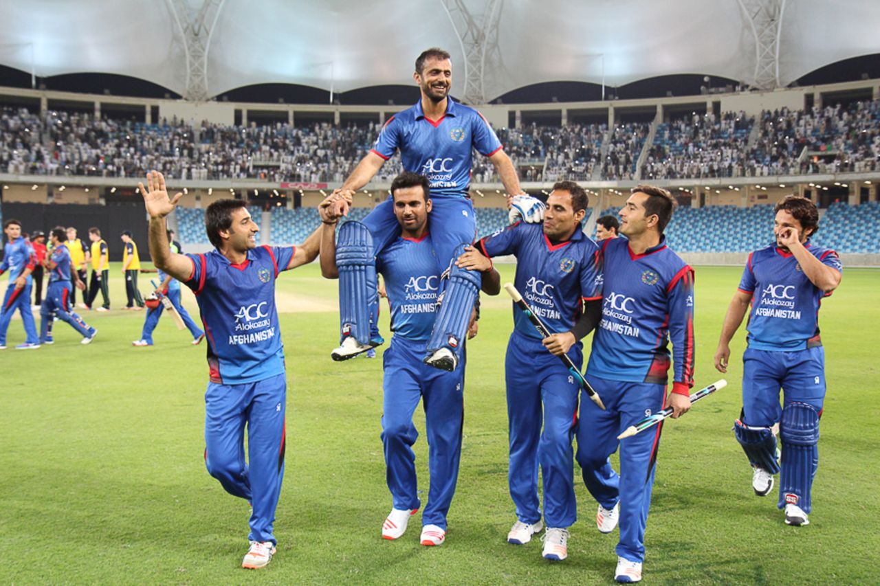 Nawroz Mangal is carried around the field by his team-mates, Afghanistan v Ireland, Desert T20, Final, Dubai, January 20, 2017