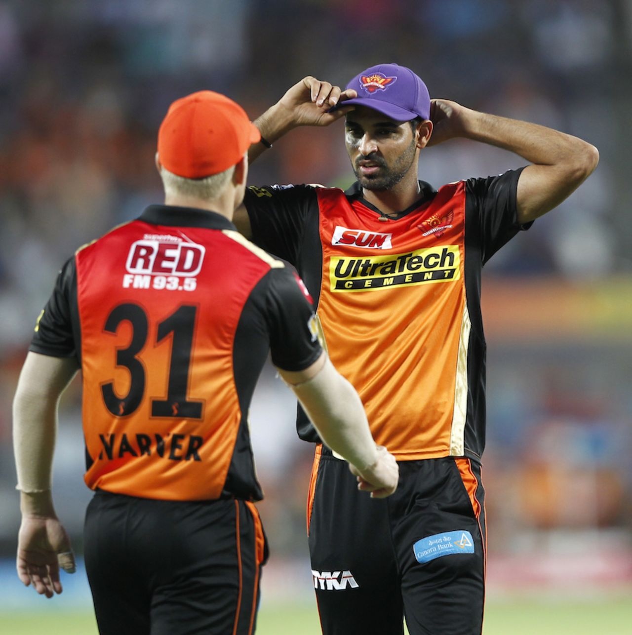 David Warner with the orange cap, and Bhuvneshwar Kumar with the purple one, Rising Pune Supergiant v Sunrisers Hyderabad, IPL 2017, Pune, April 22, 2017