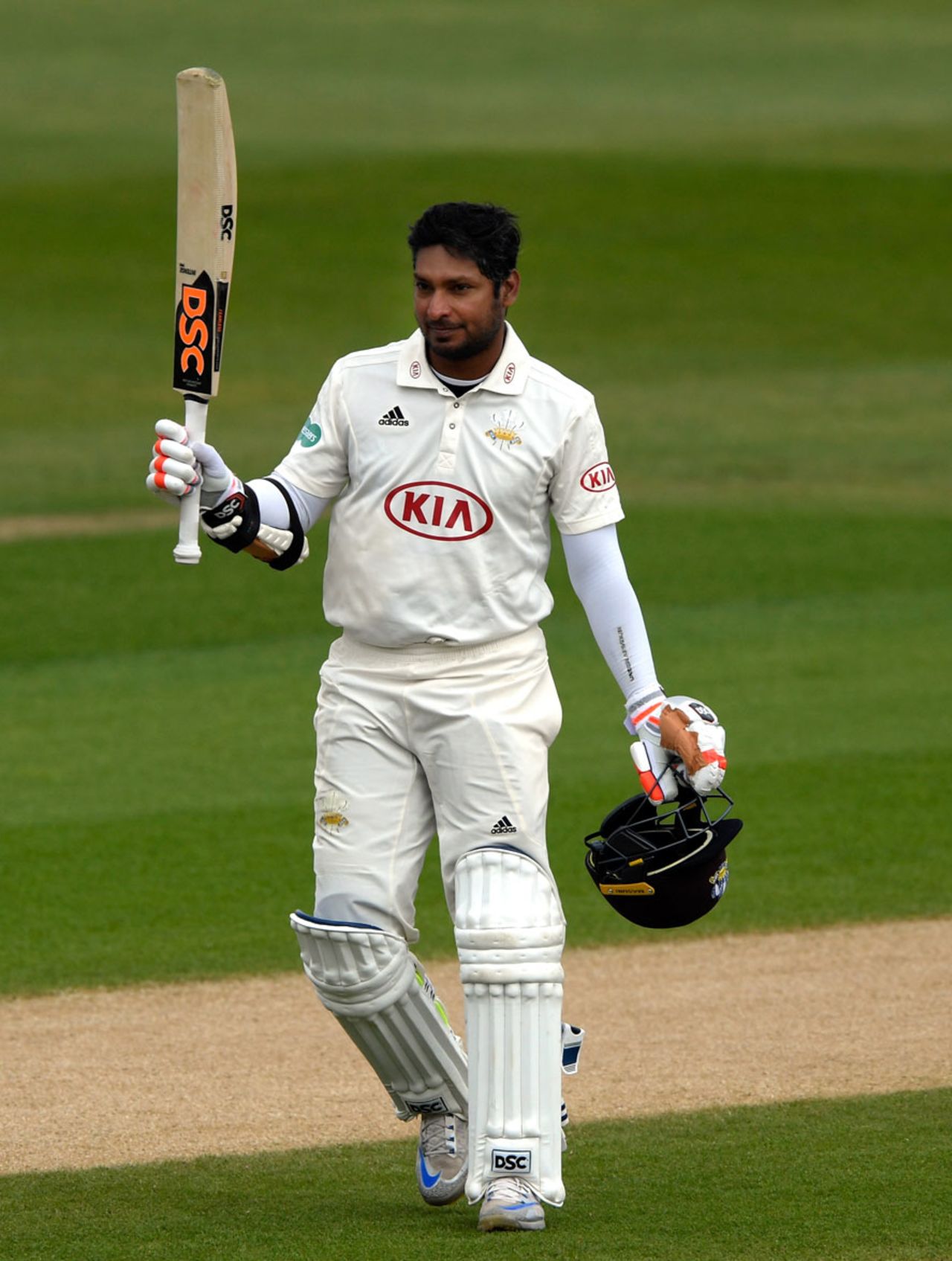 Kumar Sangakkara raises his bat on reaching his ton, Warwickshire v Surrey, County Championship, Division One, Edgbaston, 3rd day, April 23, 2017