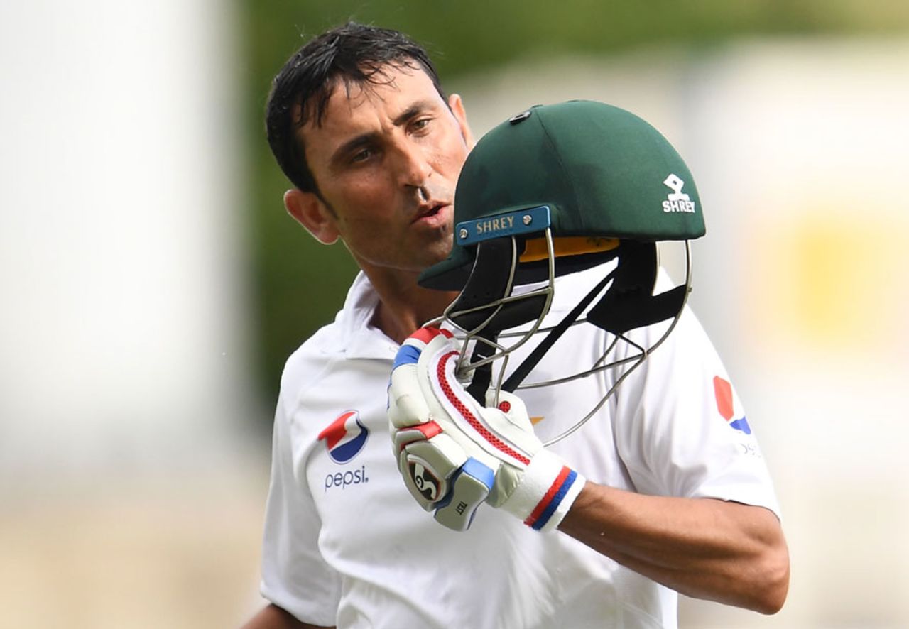 Younis Khan kisses his helmet after reaching the landmark, West Indies v Pakistan, 1st Test, Jamaica, 3rd day, April 23, 2017