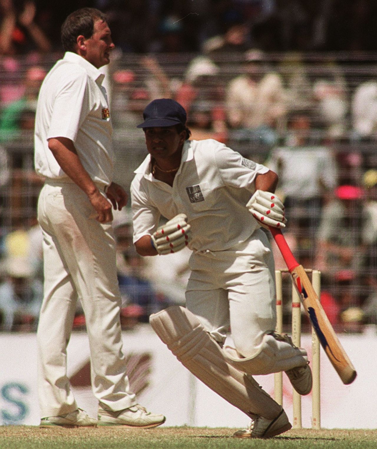 Sachin Tendulkar runs past John Emburey, India v England, 3rd Test, Bombay,3rd day,  February 21, 1993