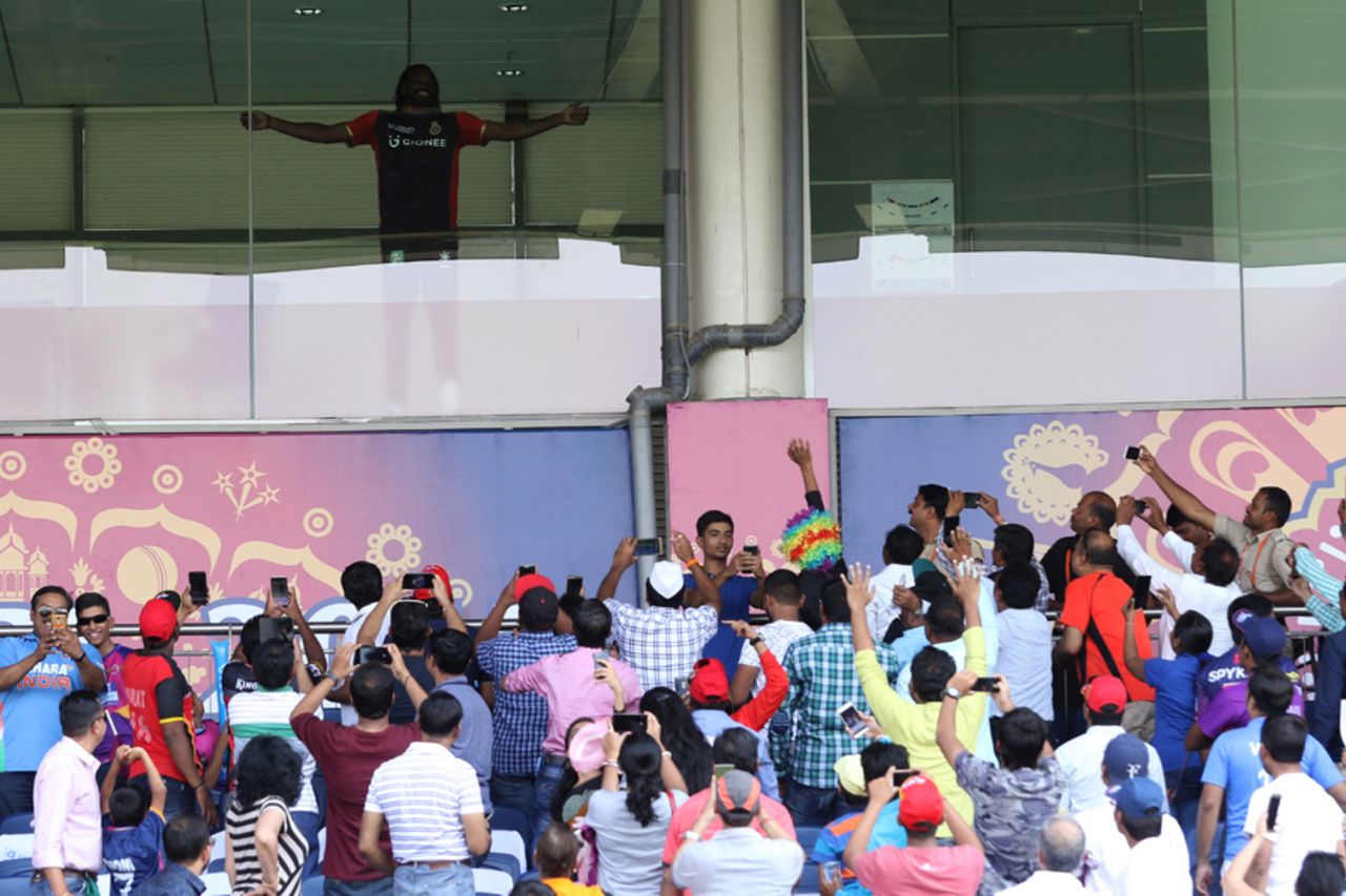 The crowd scrambles to take a snap of Chris Gayle before the match, Rising Pune Supergiant v Royal Challengers Bangalore, IPL 2017, Pune, April 29, 2017