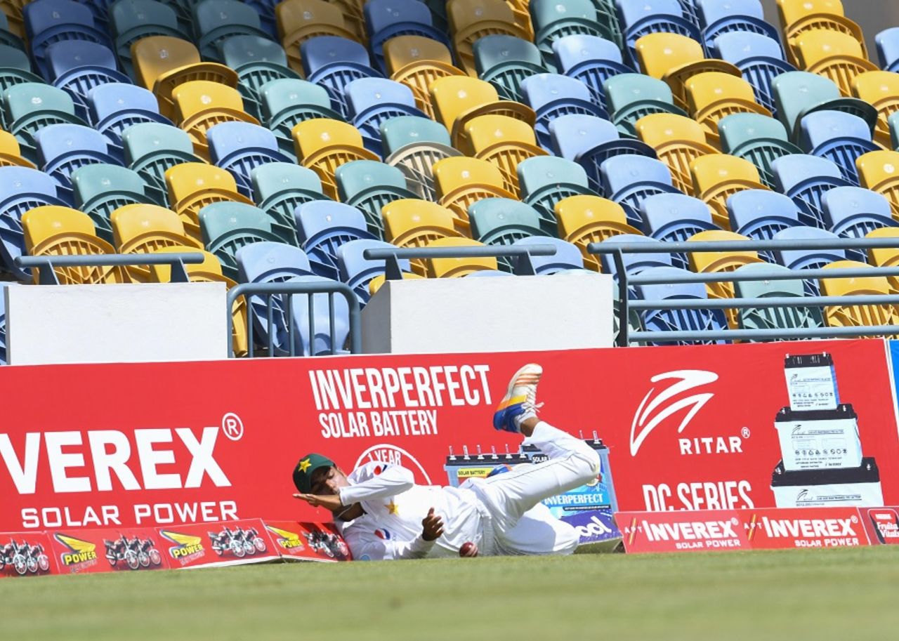 Shadab Khan tumbles near the boundary, West Indies v Pakistan, 2nd Test, Bridgetown,1st day, April 30, 2017