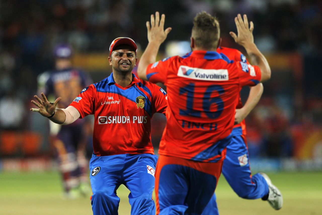 Suresh Raina rushes to embrace Aaron Finch after his direct hit from long-on, Rising Pune Supergiant v Gujarat Lions, IPL 2017, Pune, May 1, 2017