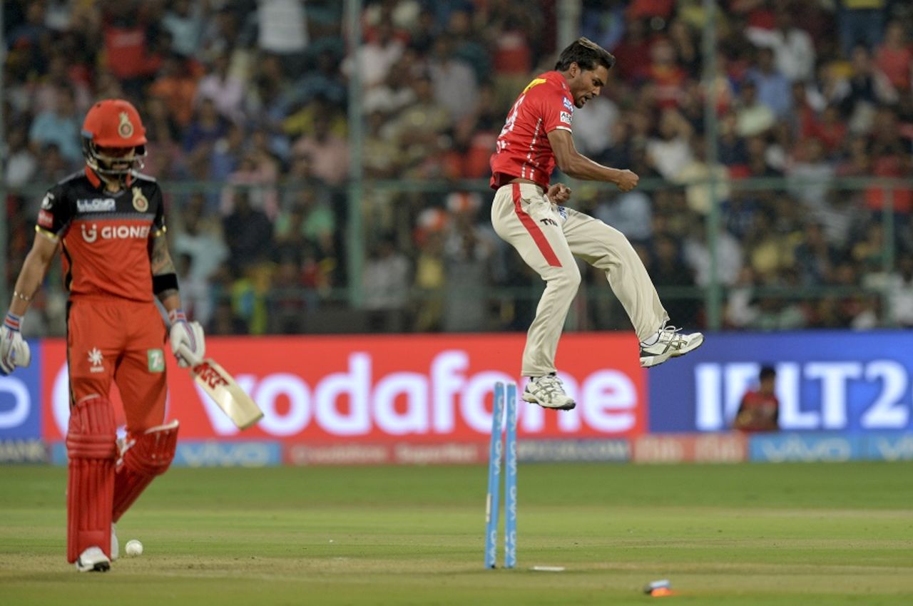 Sandeep Sharma leaps up in the air after dismissing Virat Kohli, Royal Challengers Bangalore v Kings XI Punjab, IPL 2017, Bengaluru, May 5, 2017