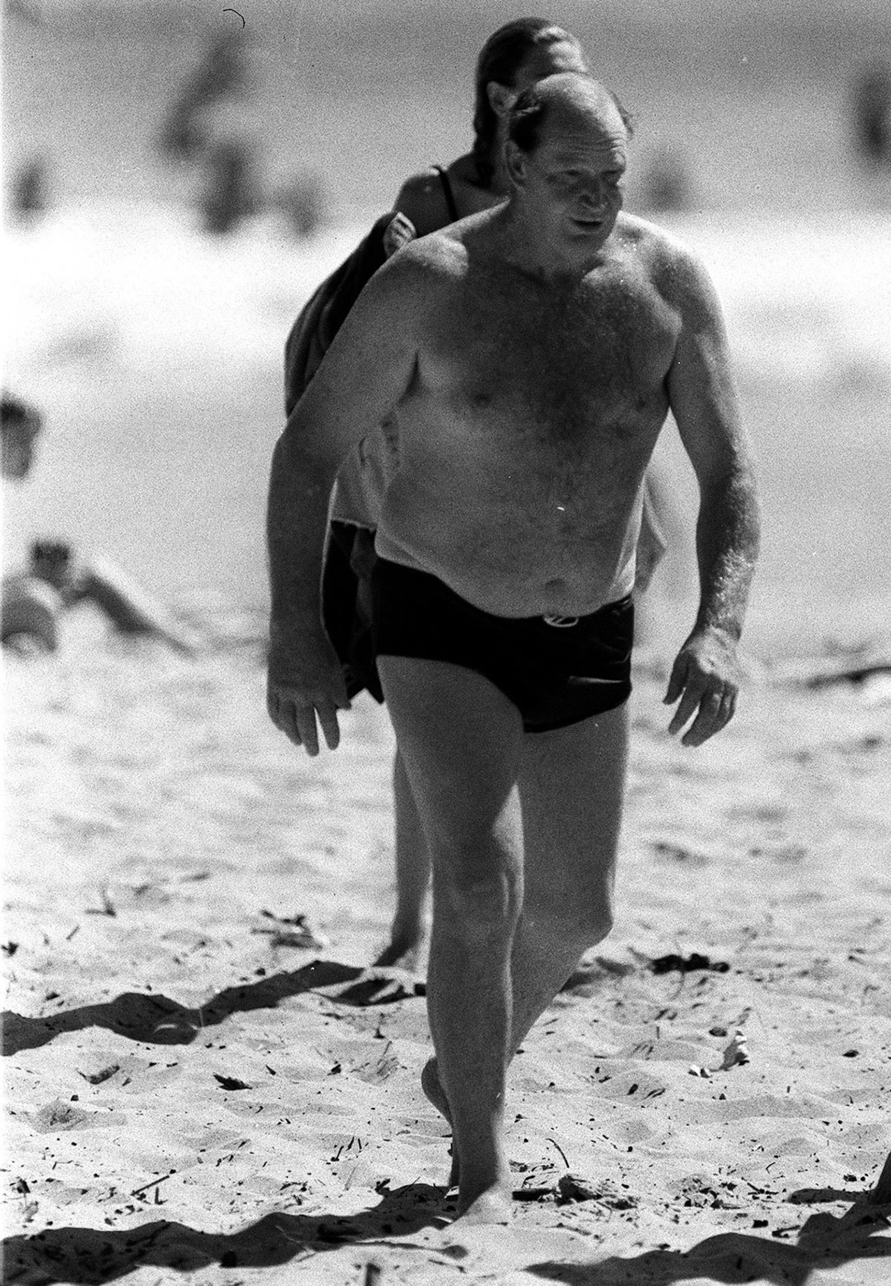Kerry Packer emerges from a dip in the ocean at Palm Beach, January 5, 1990