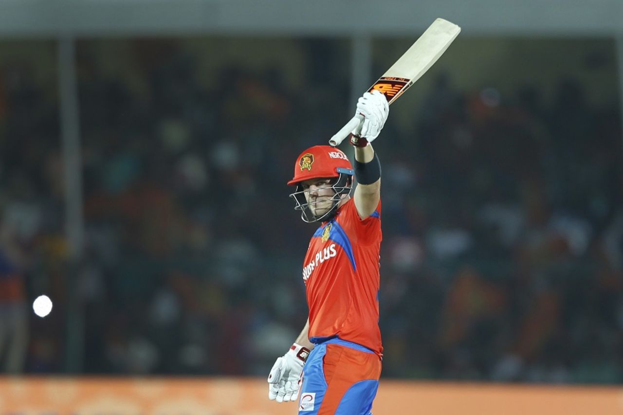 Aaron Finch raises his bat after reaching his 44th T20 fifty, Gujarat Lions v Delhi Daredevils, IPL 2017, Kanpur, May 10, 2017