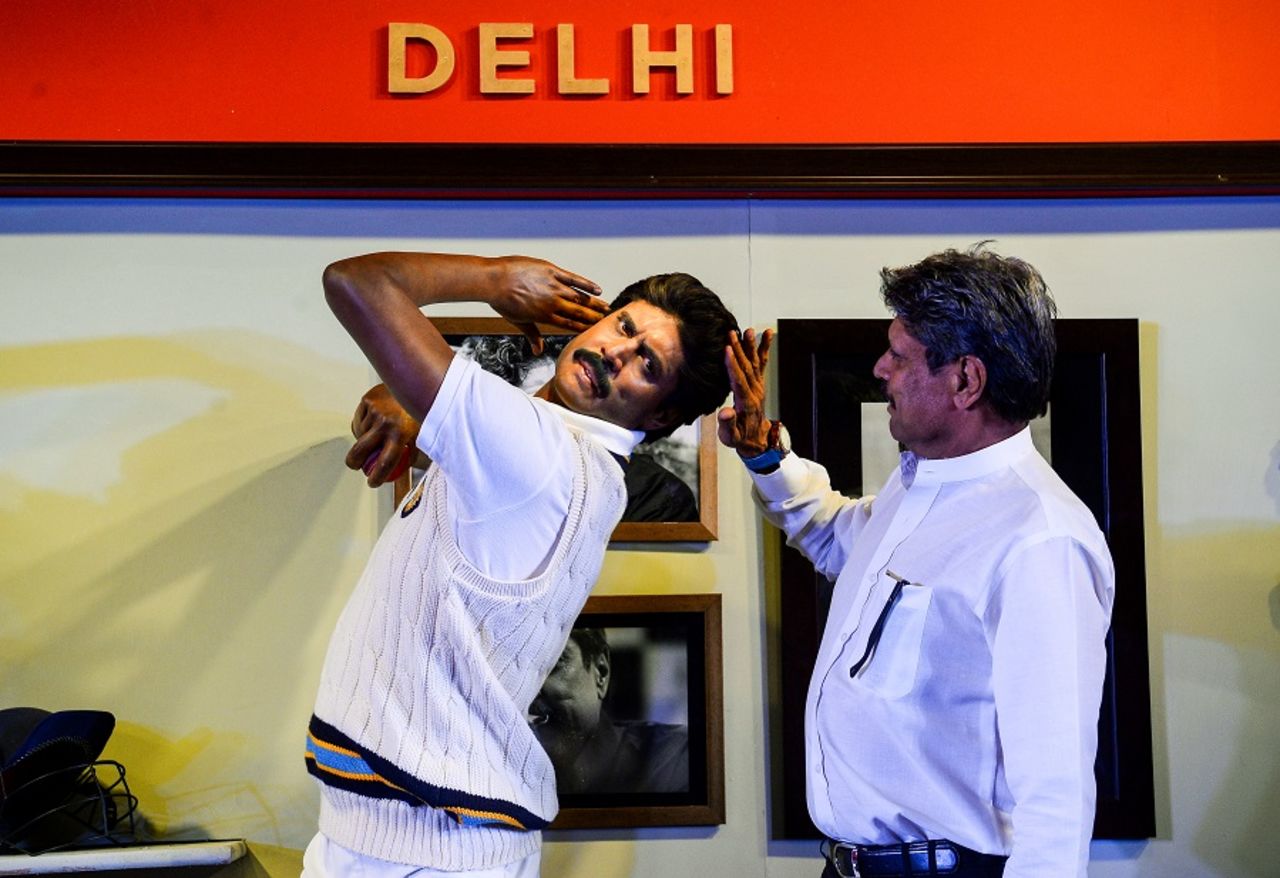 Kapil Dev admires his likeness at the Delhi launch of a Madame Tussauds museum, Delhi, May 11, 2017