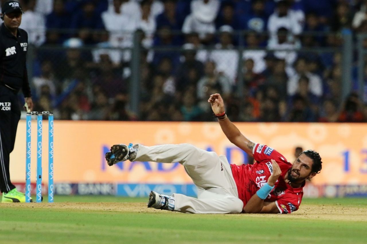 Ishant Sharma recovers from his fall after bowling a quick delivery, Mumbai Indians v Kings XI Punjab, IPL 2017, Mumbai, May 11, 2017