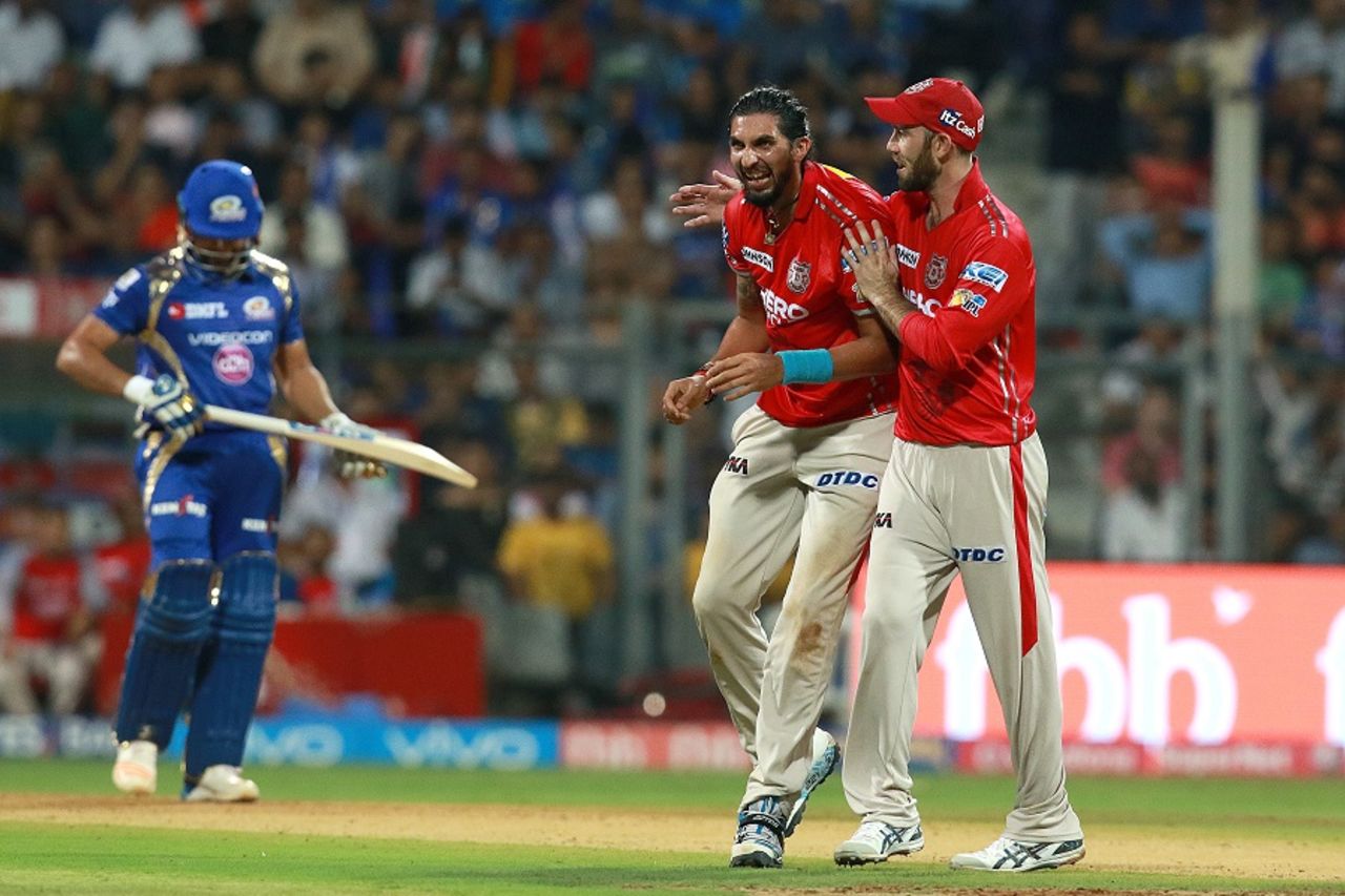 Glenn Maxwell and Ishant Sharma share a light moment after the fall of a Mumbai wicket, Mumbai Indians v Kings XI Punjab, IPL 2017, Mumbai, May 11, 2017