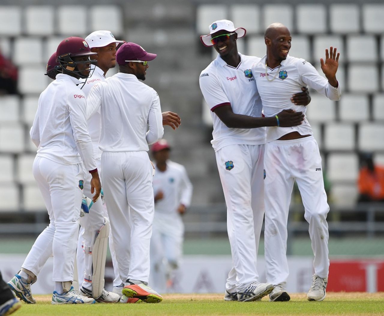 Roston Chase celebrates a wicket with team-mates, West Indies v Pakistan, 3rd Test, Roseau, 2nd day, May 11, 2017