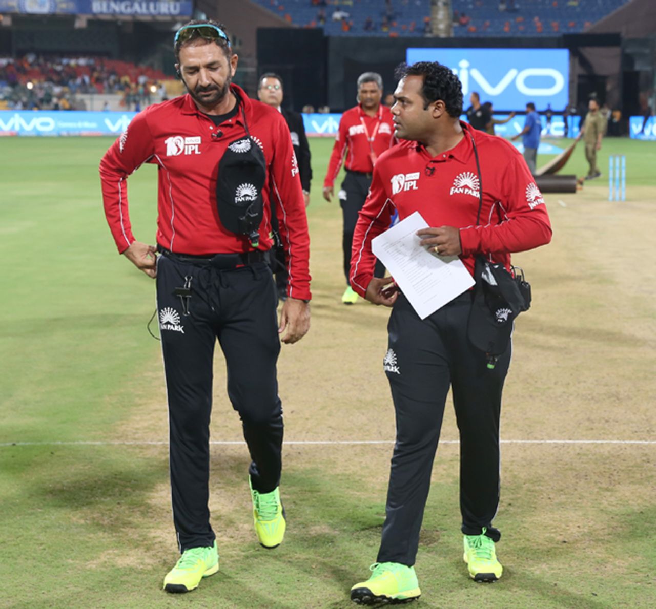 Umpires Nitin Menon and Anil Chaudhary have a chat after inspecting the pitch, Sunrisers Hyderabad v Kolkata Knight Riders, Eliminator, IPL 2017, Bangalore, May 17, 2017