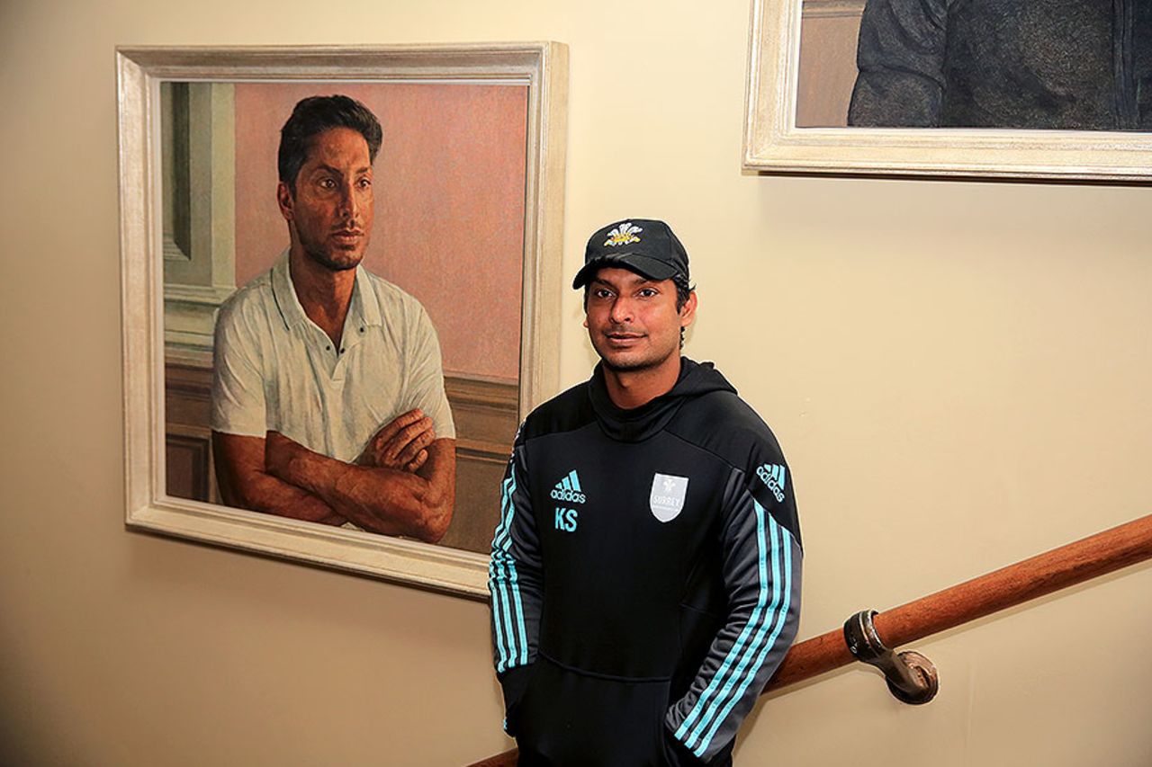 Kumar Sangakkara poses in front of his newly unveiled portrait in the Lord's Pavilion, May 18, 2017