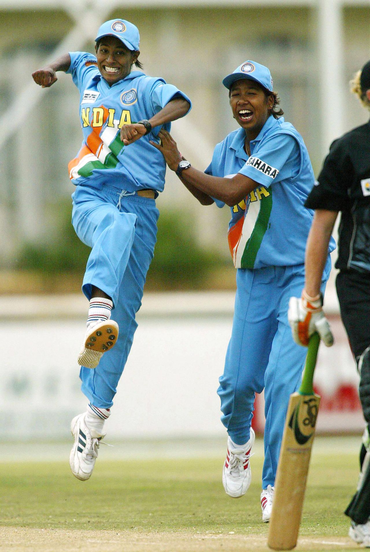 Nooshin Al Khadeer celebrates the wicket of Haidee Tiffen with team-mate Jhulan Goswami, India Women v New Zealand Women, ICC Women's World Cup, 2nd Semi-Final, Potchefstroom, April 7, 2005