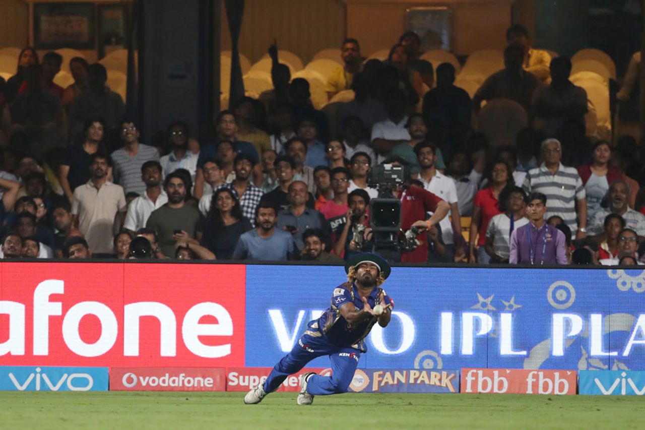 Lasith Malinga puts in a tumble at the last moment to hold on to a catch, Mumbai Indians v Kolkata Knight Riders, Qualifier 2, IPL 2017, Bengaluru, May 19, 2017