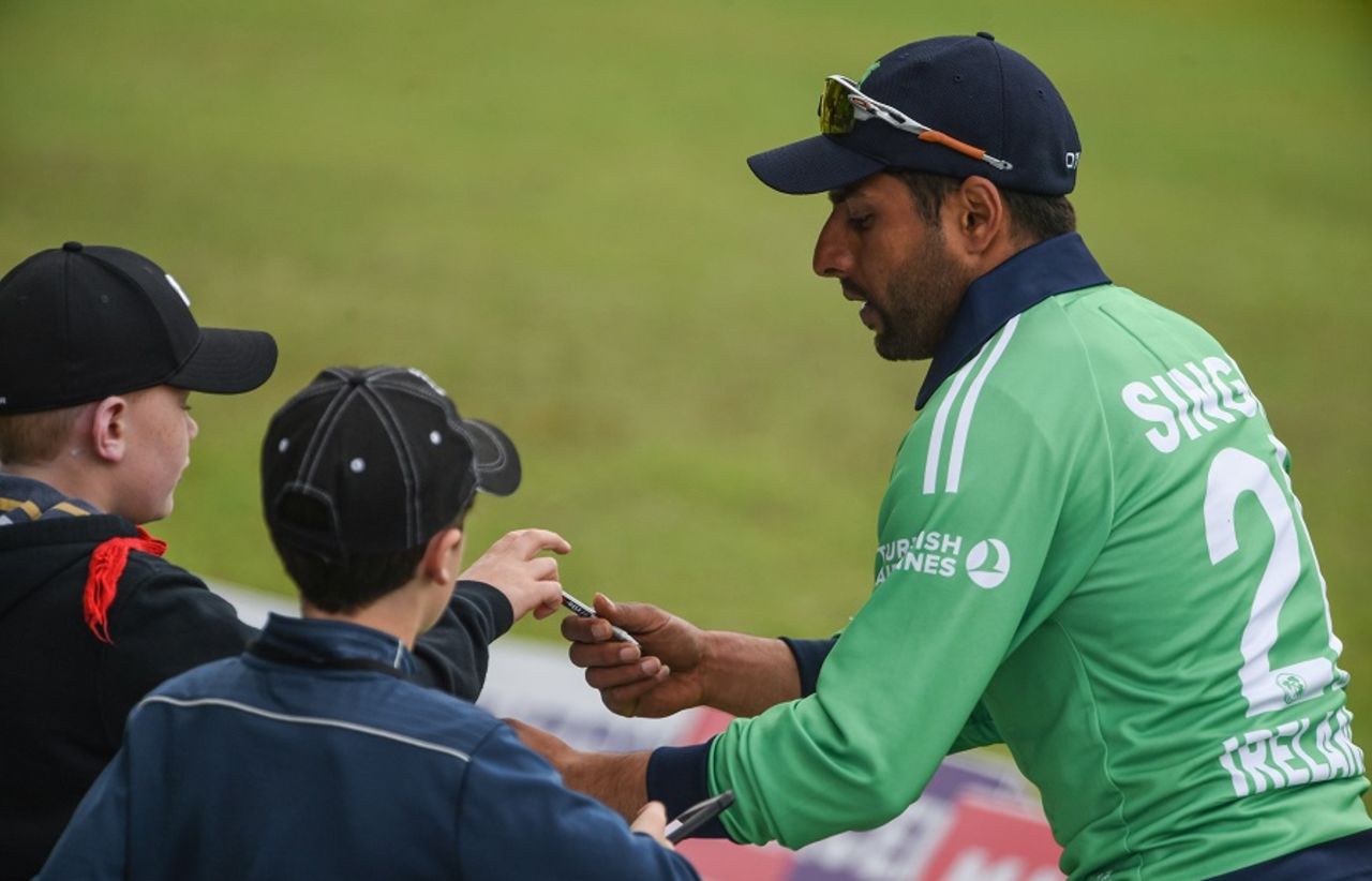 Simi Singh signs autographs near the boundary, Ireland v New Zealand, Malahide, 5th ODI, May 21, 2017